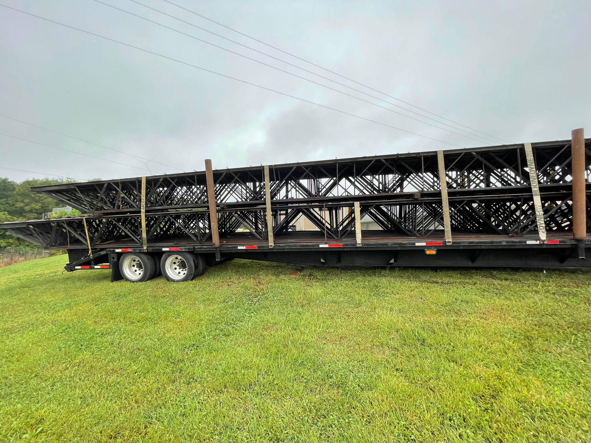 53' CLEAR SPAN TRUSSES - 38 TOTAL ON TRAILER (DOES HAVE 57 TOTAL IF BUYER W