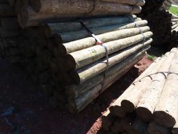BUNDLE OF WOODEN POSTS