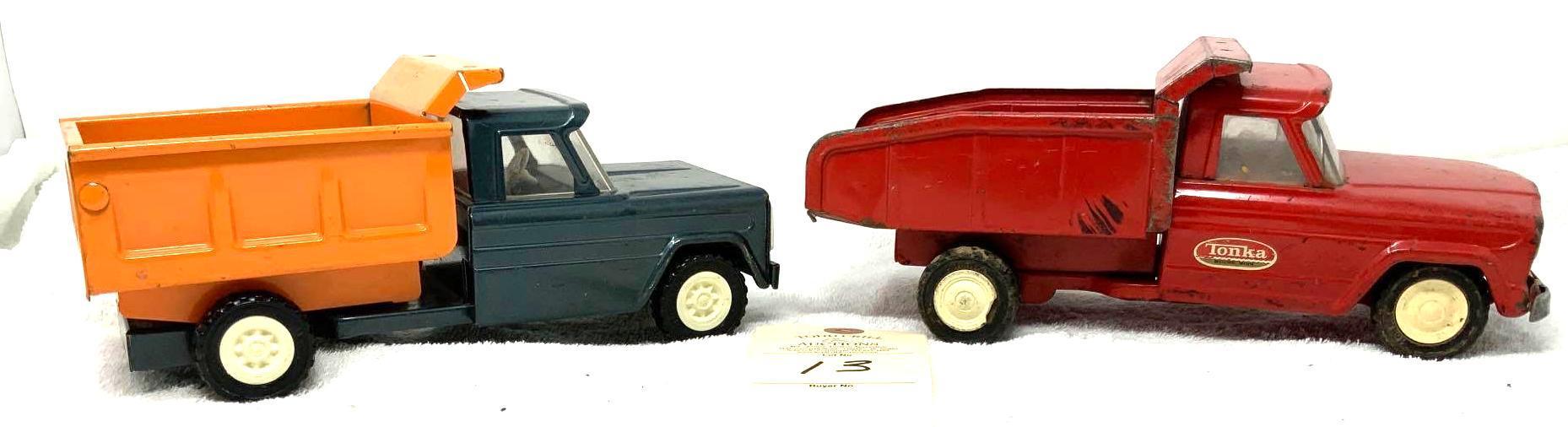 Vintage Strutco and Tonka pressed steel dump trucks