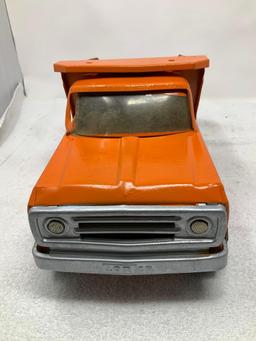 Vintage Tonka pressed steel orange dump truck