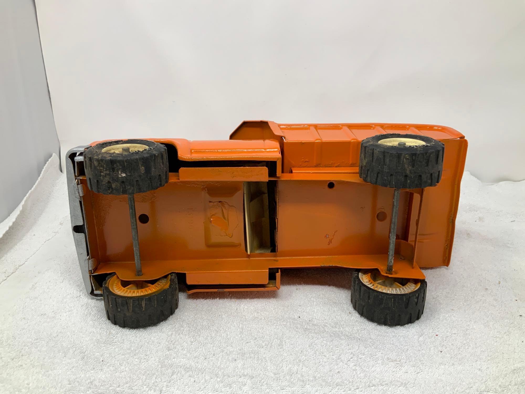 Vintage Tonka pressed steel orange dump truck