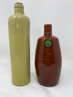 Two vintage crock bottles