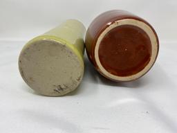 Two vintage crock bottles