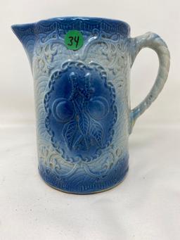 Vintage blue and white stoneware pitcher with fruit