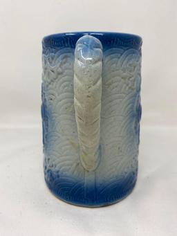 Vintage blue and white stoneware pitcher with fruit