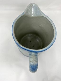 Vintage blue and white stoneware pitcher with fruit