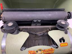 Antique Tom thumb typewriter in case