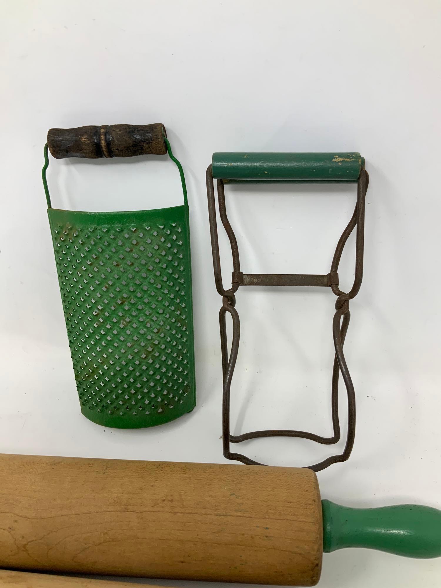 Antique green handled kitchen items