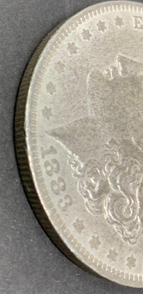 1883-O MORGAN SILVER DOLLAR