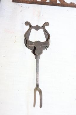 Lot of cast iron items including ink well, etc
