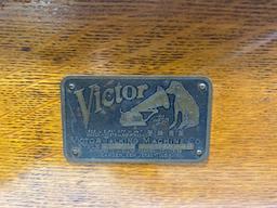 VICTOR TALKING MACHINE WITH BOOK AND TIN