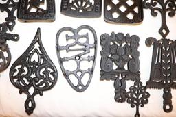 Large Quantity of Cast Iron Trivets