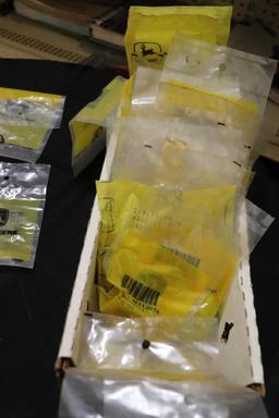 Quantity of New Old Stock John Deere Mower Parts to include