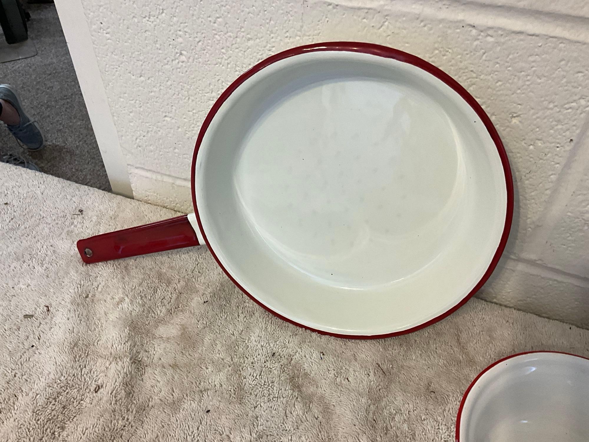 assortment of white w/red enamel skillet, plates, cups, & bowls