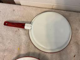 assortment of white w/red enamel skillet, plates, cups, & bowls