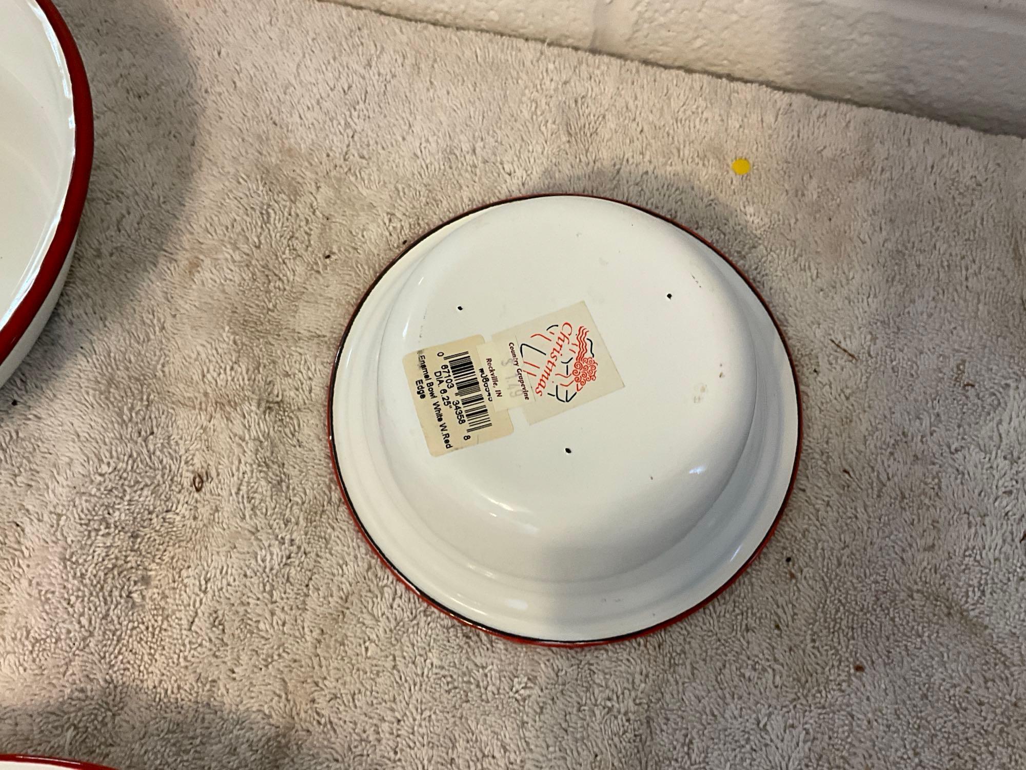 assortment of white w/red enamel skillet, plates, cups, & bowls