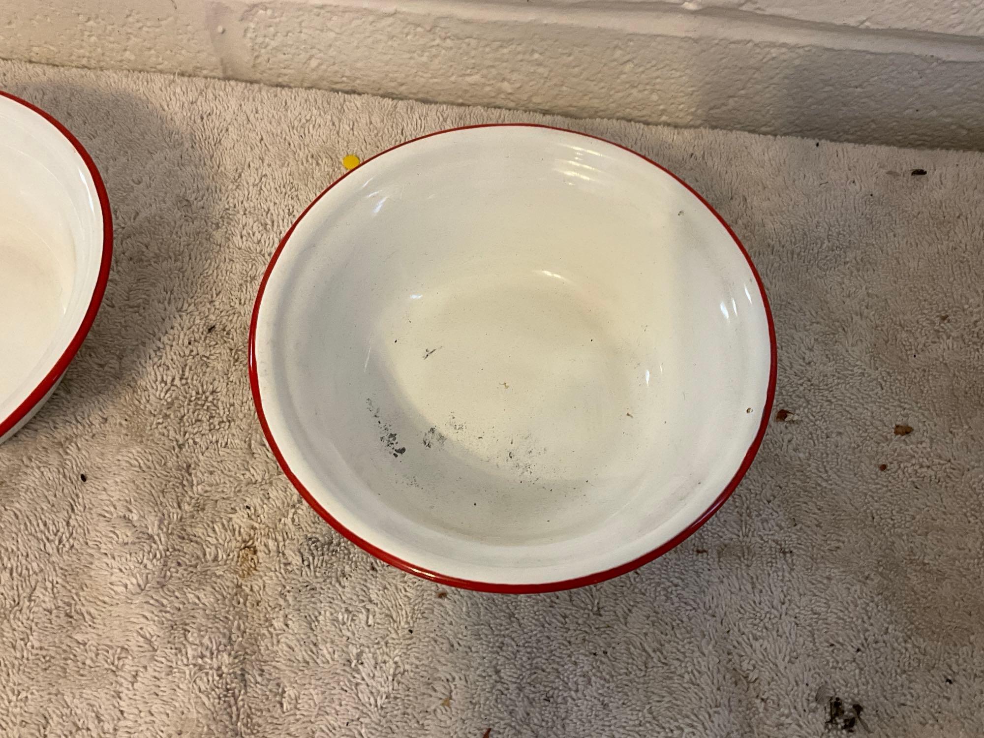 assortment of white w/red enamel skillet, plates, cups, & bowls