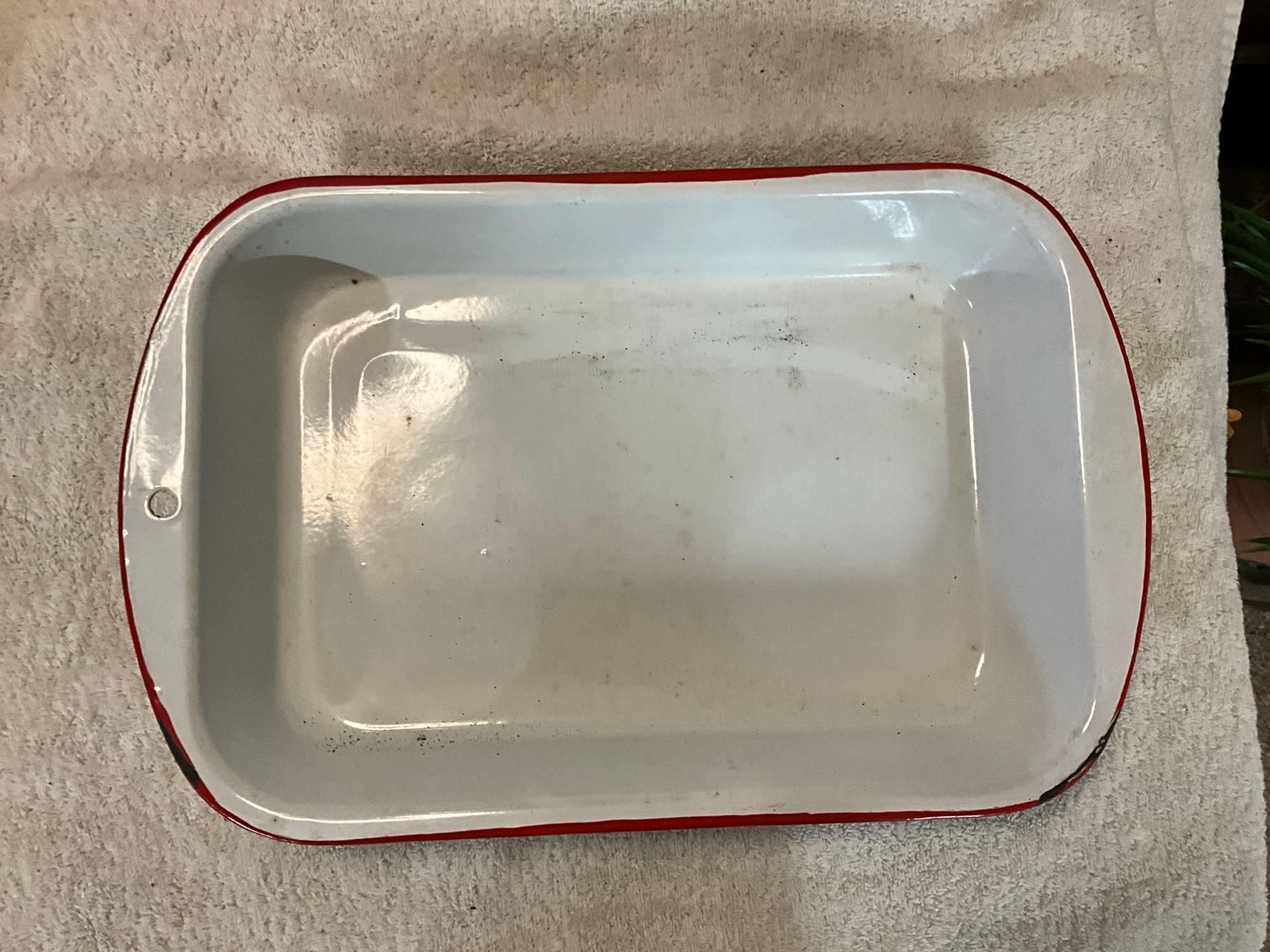 white w/red enamel casseroles, meat platter, & kitchen utensils