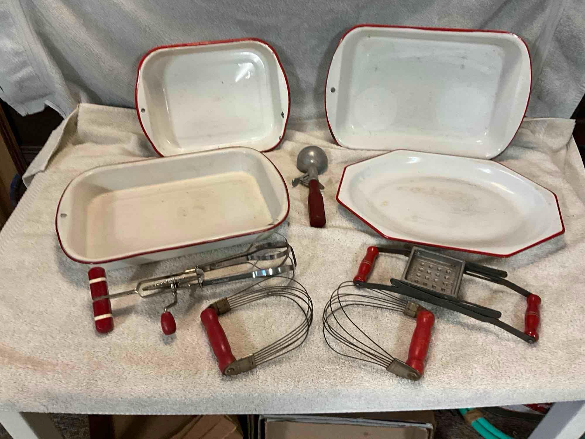 white w/red enamel casseroles, meat platter, & kitchen utensils