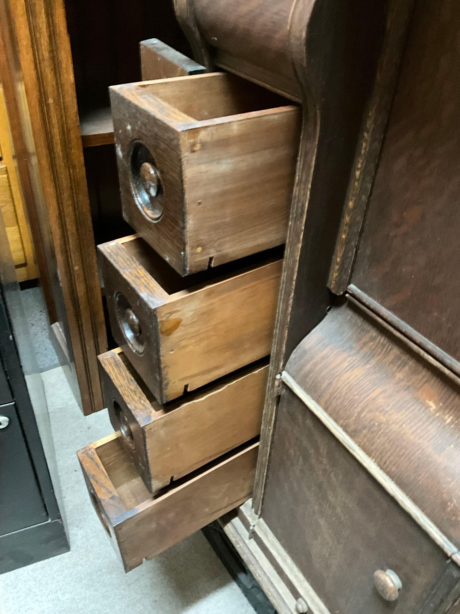 Singer Treadle sewing machine in oak cabinet