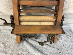 unmarked primitive wash tub wringer,