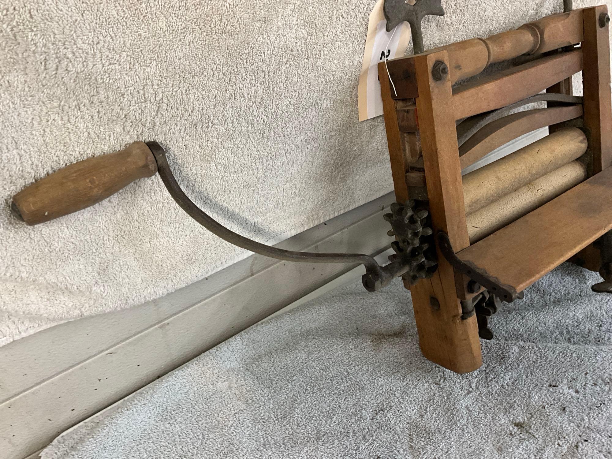 unmarked primitive wash tub wringer,
