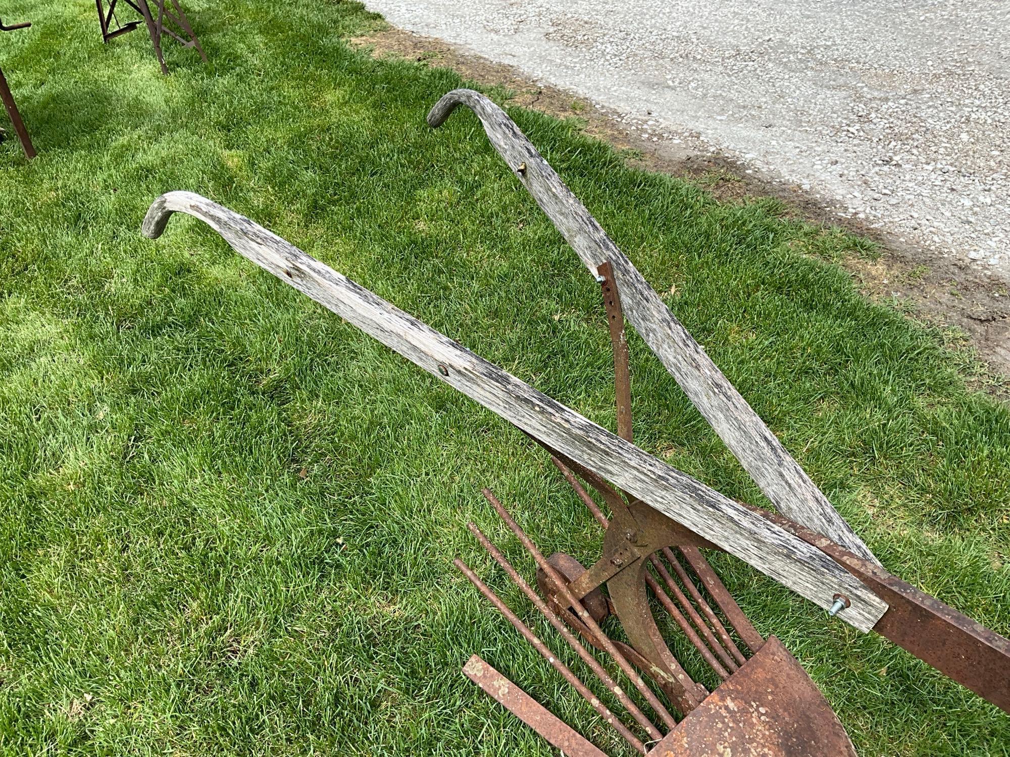 Early horse drawn potato plow