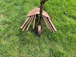 Early horse drawn potato plow