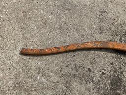 Wood handled scythe and iron pump handle