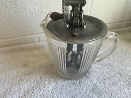 unmarked coffee grinder & glass pitcher w/kitchen mixer