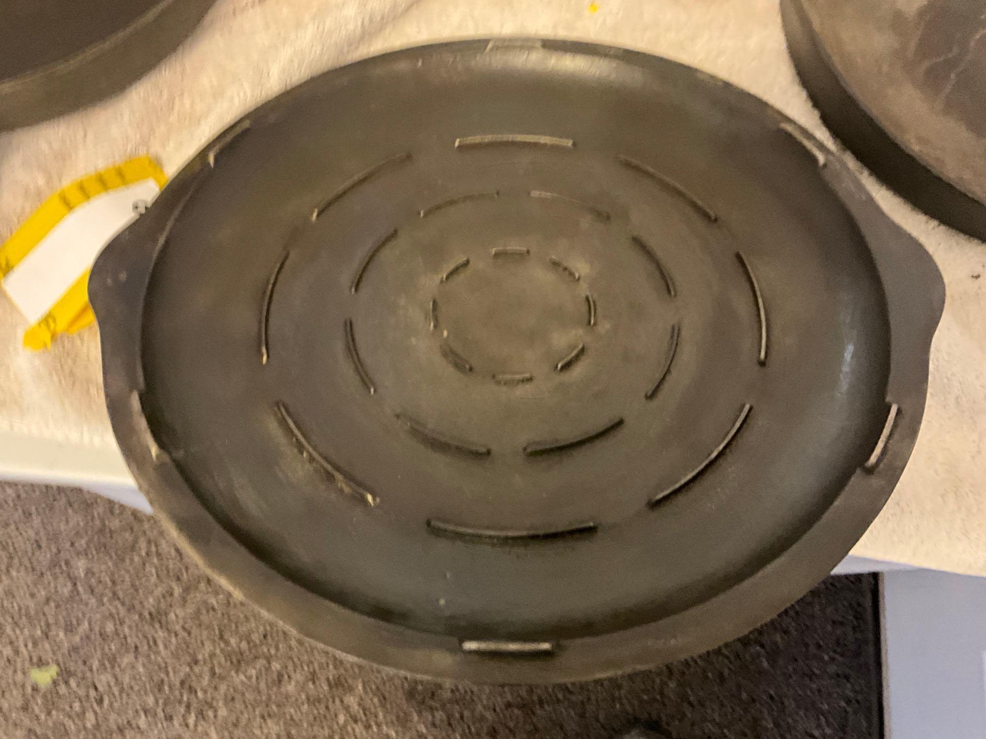 (2) unmarked USA cast iron skillets