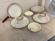 assortment of white w/red enamel skillet, plates, cups, & bowls