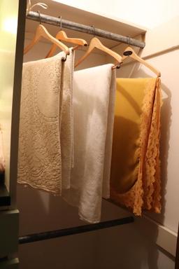 Contents of closet to include Tablecloths & Linens