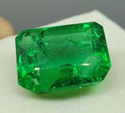 Green Emerald gemstone 9.57ct Emerald cut with gym ID card