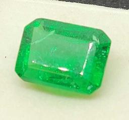 Green Emerald gemstone 9.57ct Emerald cut with gym ID card