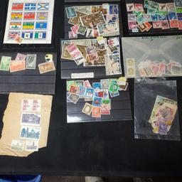 box of stamps and stamped envelopes from around the world