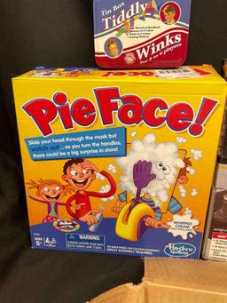 Bin Full of Assorted Games. Glass chess Boards, Pie Face, Helicopter Model, Tiddly Winks,more