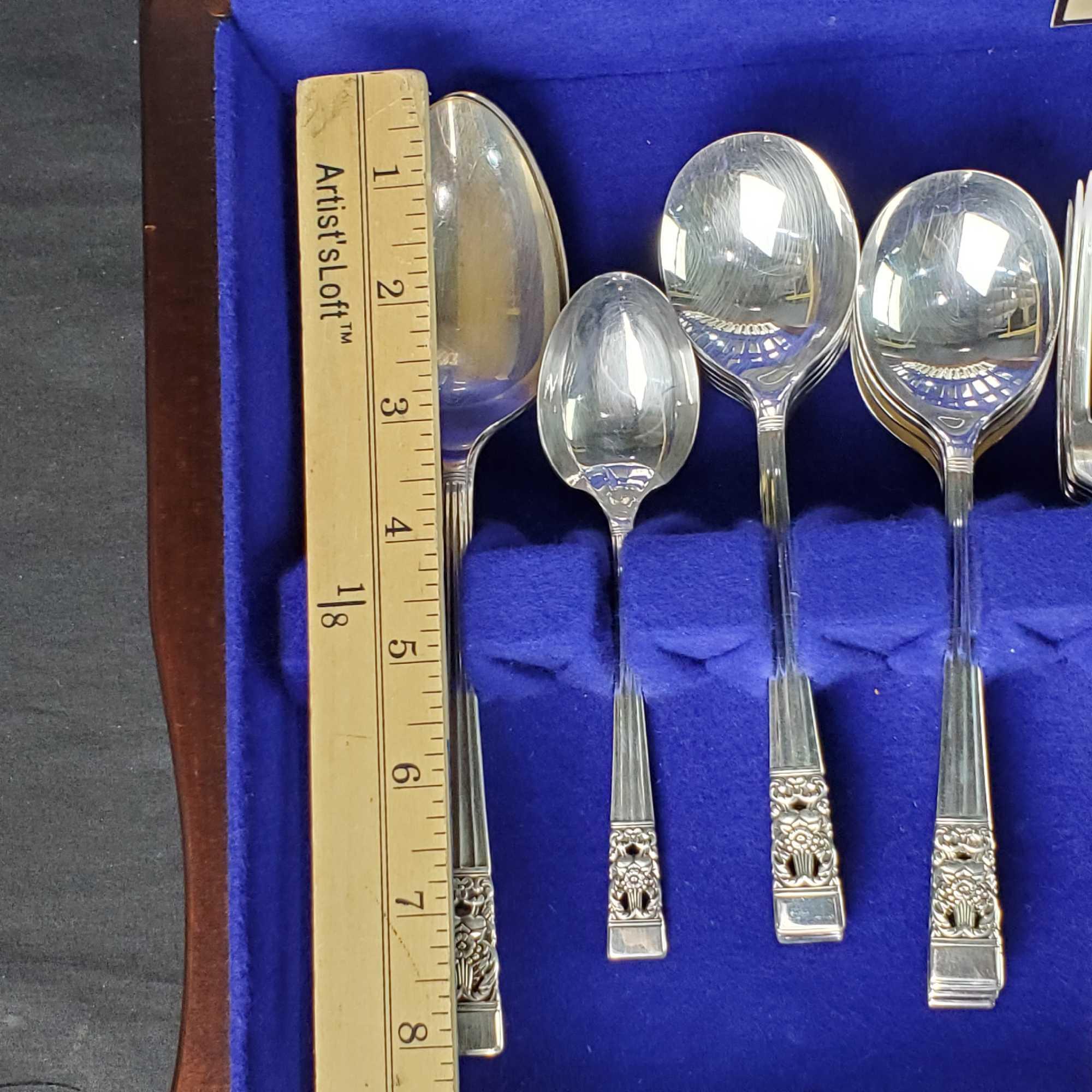 wooden silverware case with Community Silverplate flatware