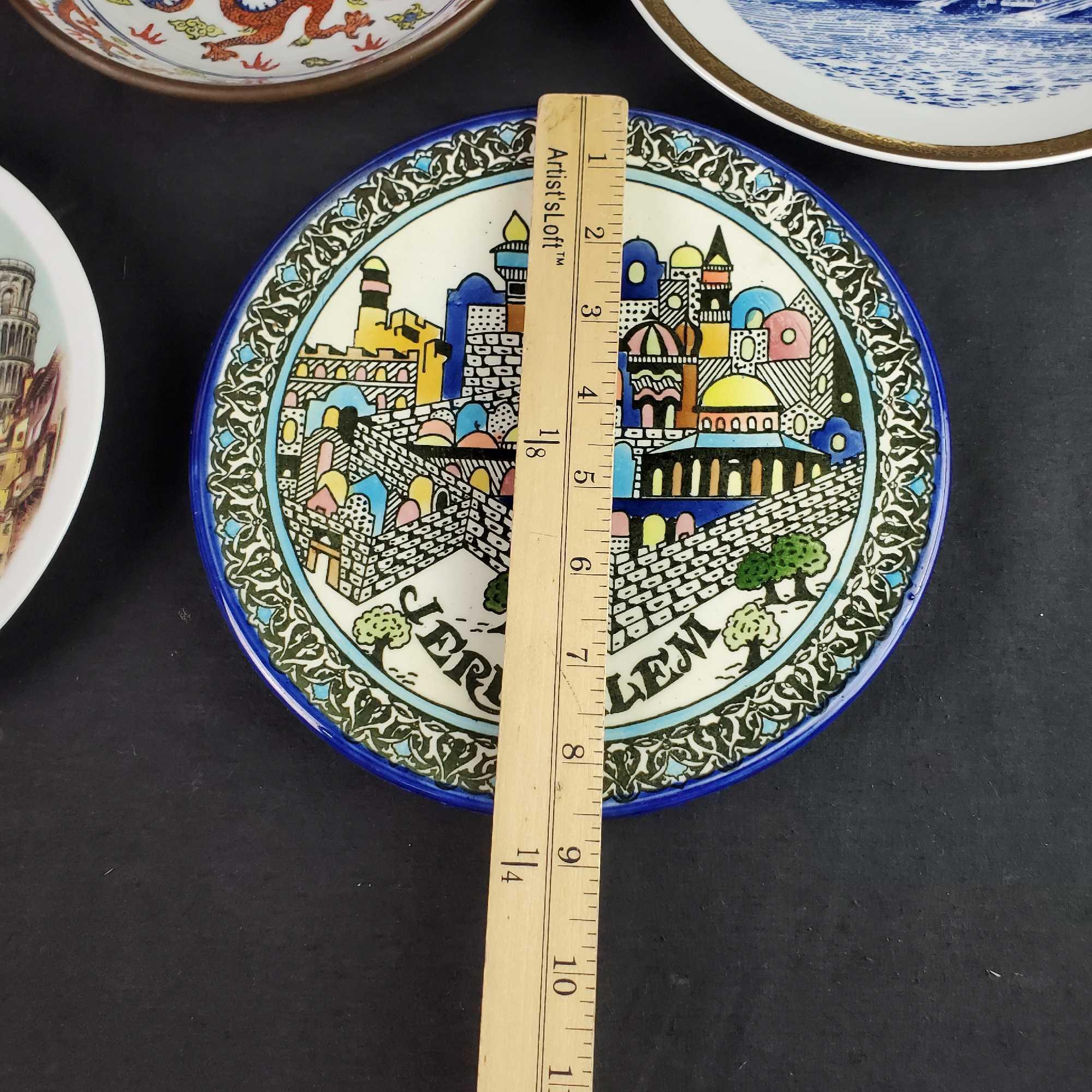 8 decorative plates Praha Jerusalem Italy etc. some hand painted