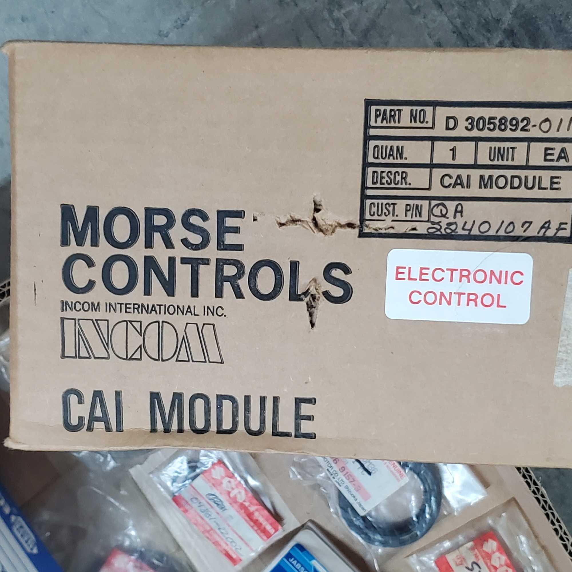 Box of Suzuki Morse Johnson Evinrude marine starter motor CAI module tire bar kit rig replacement