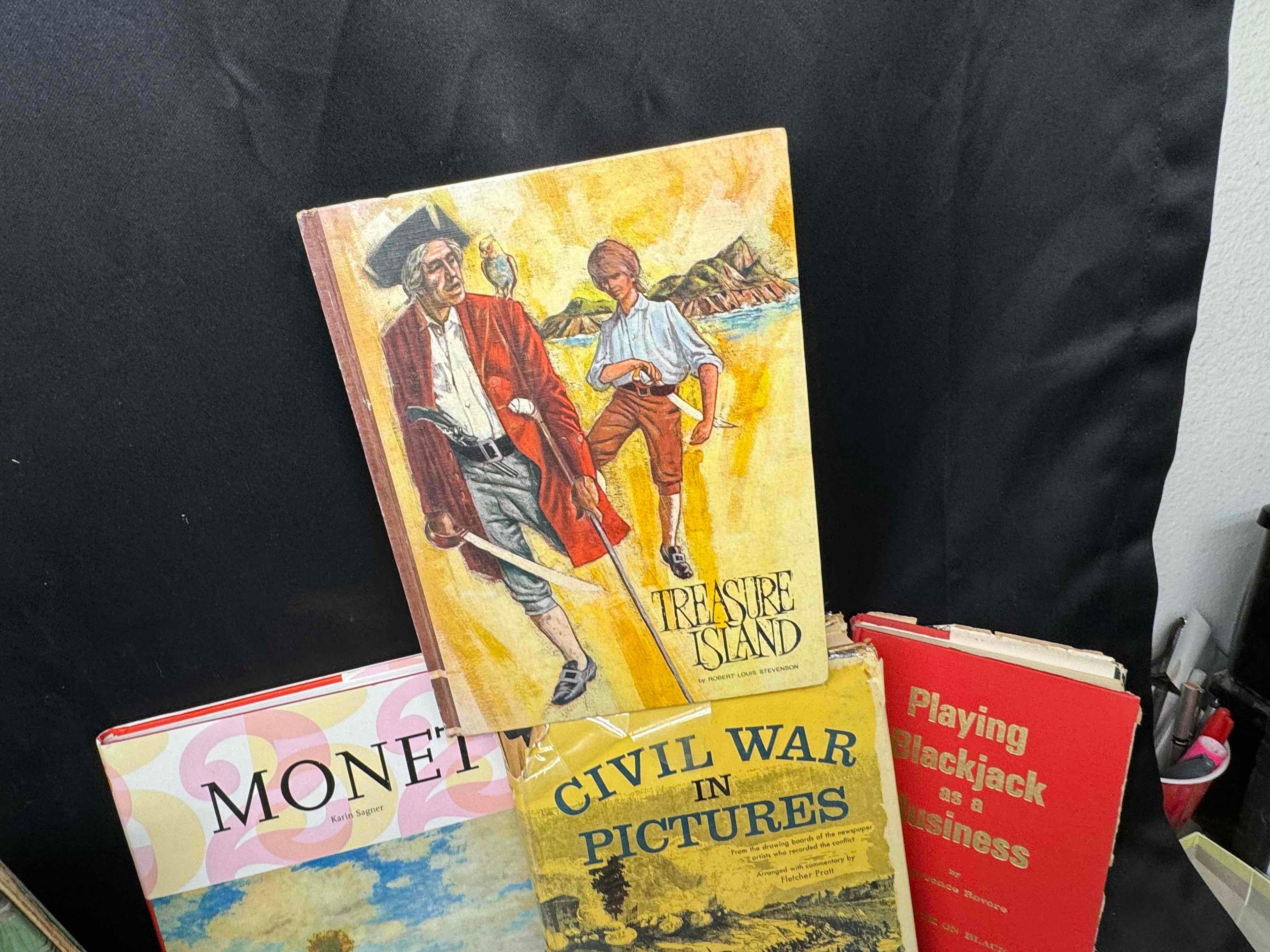 Assorted Books. Monet, Treasure Island, Norman Rockwell more