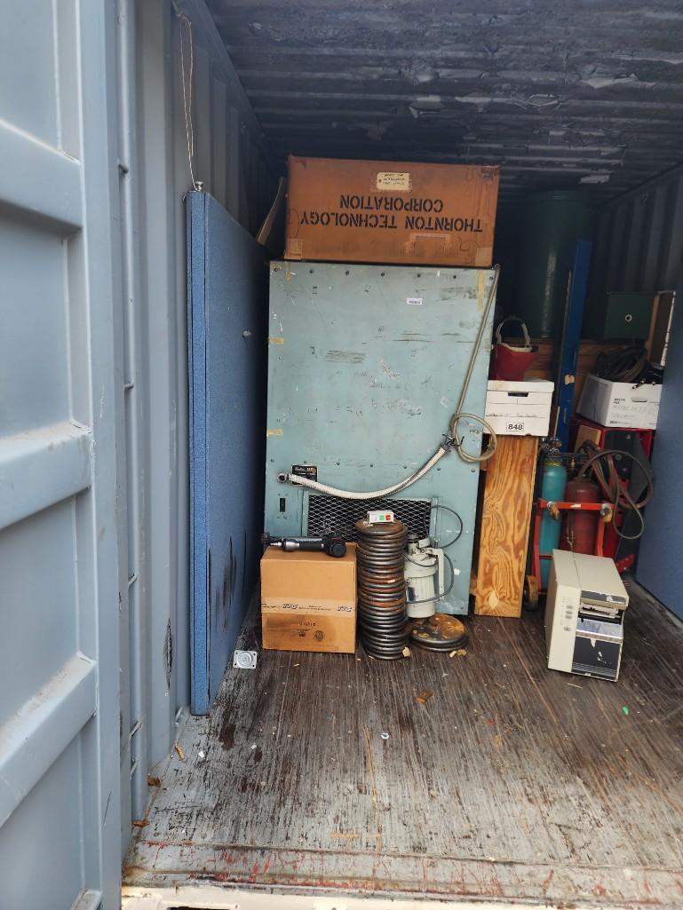 Container contents- unopened crates tools safe etc