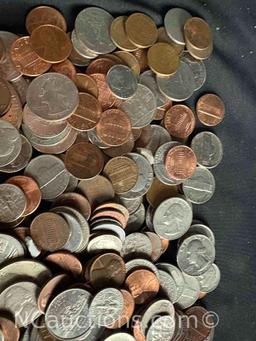 over 4 pounds of US Pennies dimes nickels, quarters dollars.