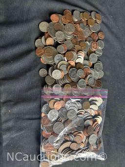 over 4 pounds of US Pennies dimes nickels, quarters dollars.