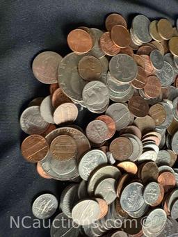 over 4 pounds of US Pennies dimes nickels, quarters dollars.