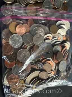 over 4 pounds of US Pennies dimes nickels, quarters dollars.