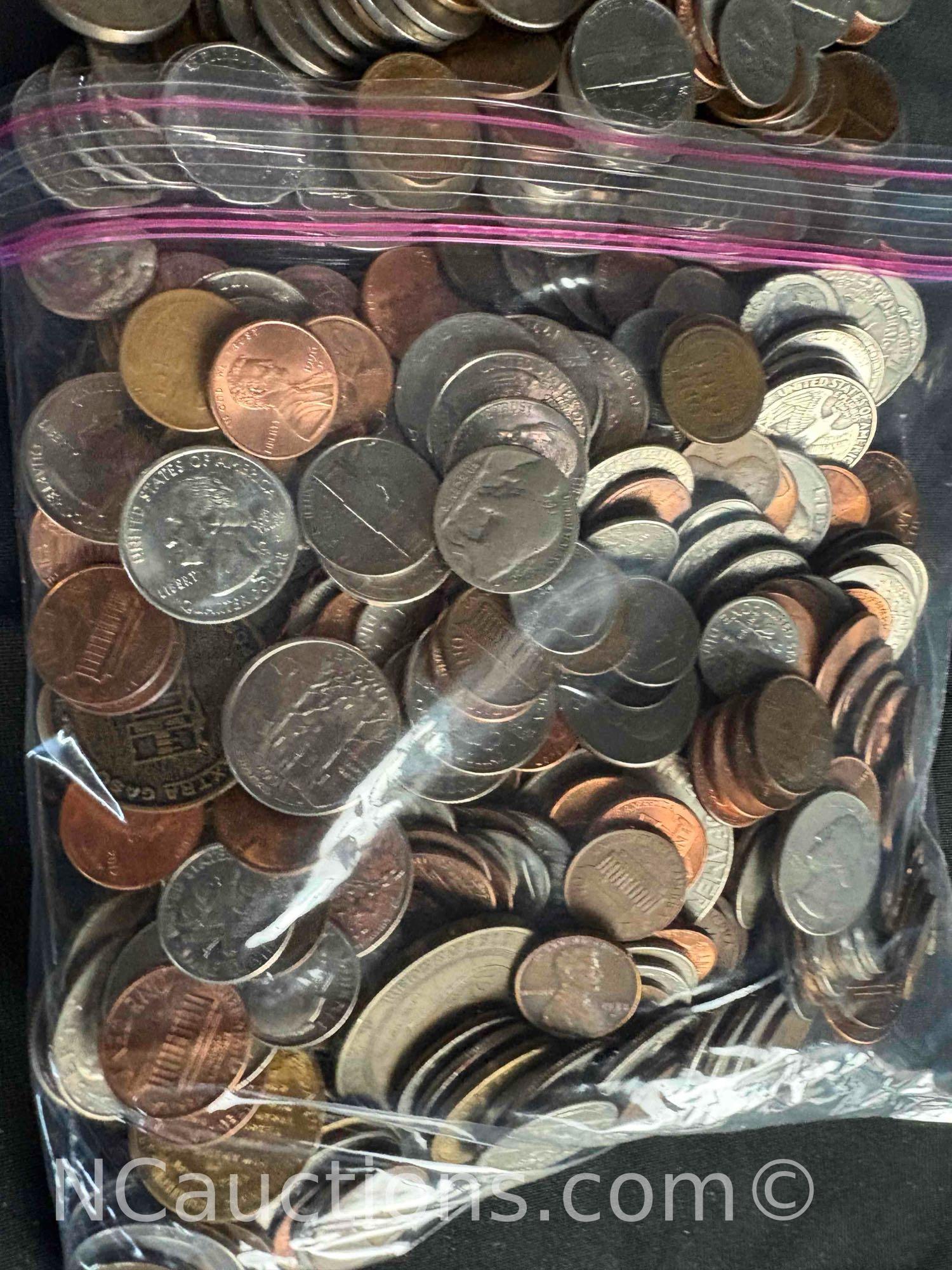 over 4 pounds of US Pennies dimes nickels, quarters dollars.