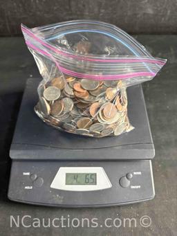 over 4 pounds of US Pennies dimes nickels, quarters dollars.