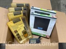 Box of new in package Motorola Walkie Talkie and Digital Scale