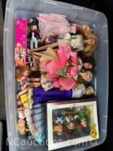 bin of Barbie dolls